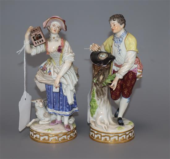 Two Meissen figures of a boy with a bird nest and girl with a bird cage, late 19th century, H. 18cm, minor losses